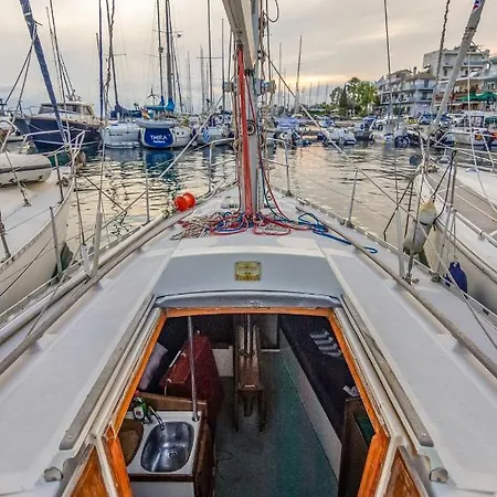 Relaxing In A Cozy Sailing Boat In